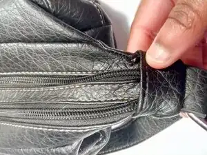 How to Sew a Hole and reattach zippers to a purse