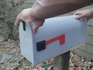 How to Reattach the Head of a Mailbox to the Base