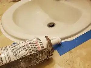 How to re-caulk a bathroom sink