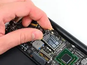 MacBook Air 11" Mid 2011 AirPort/Bluetooth Card Replacement