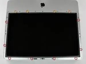 Installazione della mascherina anteriore nell'iMac Intel EMC 2133 ed EMC 2210 da 20"