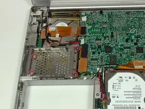 Sostituzione dello scomparto della scheda PC del PowerBook G4 Aluminum 15" 1.67 GHz