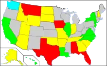 Map showing (1) California, Hawaii, Illinois, Louisiana, New Jersey, New York, North Carolina, Delaware and Virginia have implemented COVID-19 vaccine passports; (2) Alabama, Arizona, Florida, Idaho, Indiana, Iowa, Montana, North Dakota, South Carolina, South Dakota, Texas, and Wyoming have banned COVID-19 passports; (3) that Alaska, Arkansas, Georgia, Missouri, New Hampshire, Oklahoma, Tennessee, and Utah have partially banned COVID-19 vaccine passports; (4) that Washington has a significant locality that has implemented a COVID-19 passport