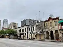 Businesses with boarded windows and entrances