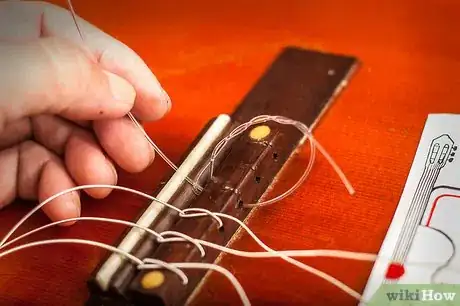 Immagine titolata Change Classical Guitar Strings Step 4Bullet3