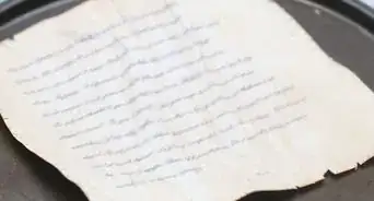 Invecchiare la Carta Usando il Tè