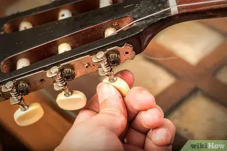 Immagine titolata Change Classical Guitar Strings Step 10