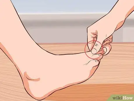 Immagine titolata Use Acupressure to Induce Labour Step 3