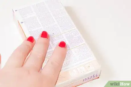 Immagine titolata Wax Your Face Step 4