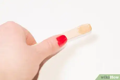 Immagine titolata Wax Your Face Step 6