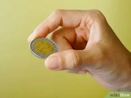 Immagine titolata Flip a Coin Step 1