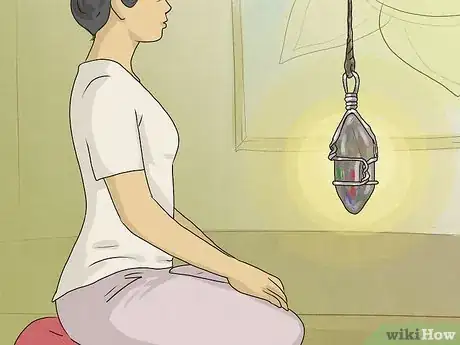 Immagine titolata Clear Your Chakras with a Pendulum Step 3