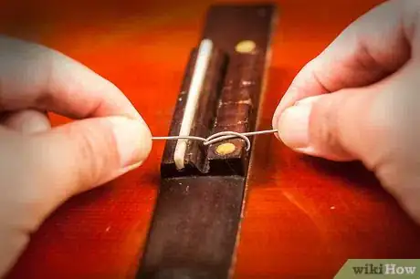 Immagine titolata Change Classical Guitar Strings Step 3Bullet5