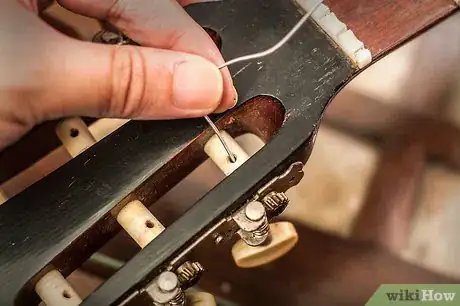 Immagine titolata Change Classical Guitar Strings Step 6