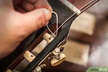 Immagine titolata Change Classical Guitar Strings Step 9