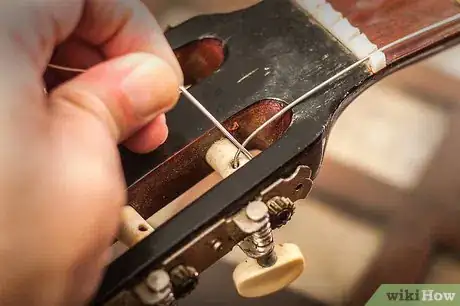 Immagine titolata Change Classical Guitar Strings Step 8