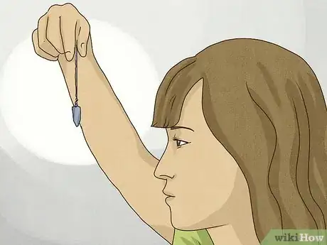 Immagine titolata Clear Your Chakras with a Pendulum Step 6