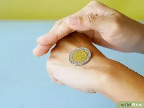 Immagine titolata Flip a Coin Step 7