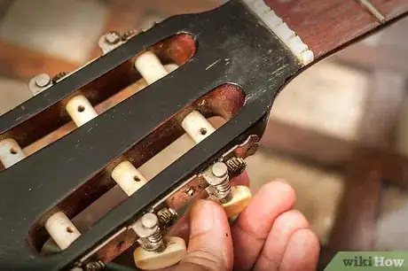 Immagine titolata Change Classical Guitar Strings Step 5